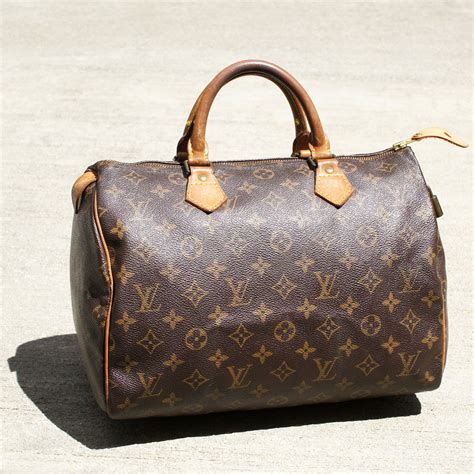 louis vuitton auction prices|vintage Louis Vuitton bags for sale.